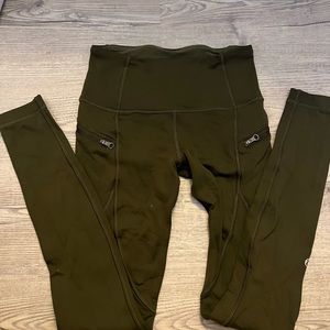 Size 4 or an xs lulu lemon army green leggings with zip pockets